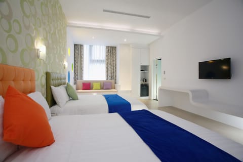 Comfort Quadruple Room, City View (Due to safety concerns, minimum occupancy 2 people) | Desk, blackout drapes, soundproofing, free WiFi