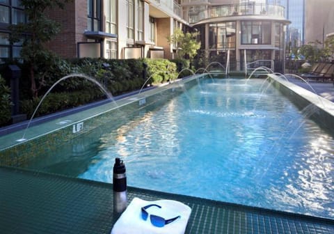 Outdoor pool, open 7:00 AM to 10:00 PM, sun loungers