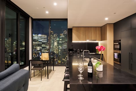 Deluxe Apartment, 2 Bedrooms, City View | Living area | 50-inch LED TV with cable channels, TV, pay movies
