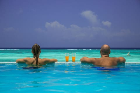 2 outdoor pools, open 7:00 AM to 8:00 PM, pool umbrellas, sun loungers