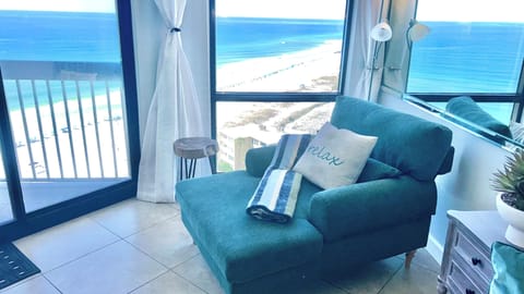 Lounge chair by the window for those views!! You won’t want to leave this spot. 