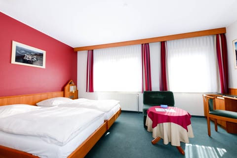 Premium bedding, memory foam beds, minibar, in-room safe