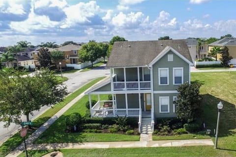 Front elevation featuring two furnished porches