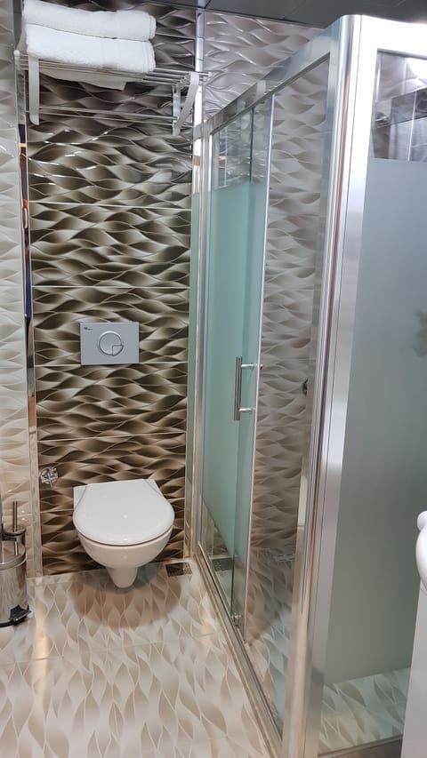 Double or Twin Room, City View | Bathroom | Shower, free toiletries, hair dryer, slippers