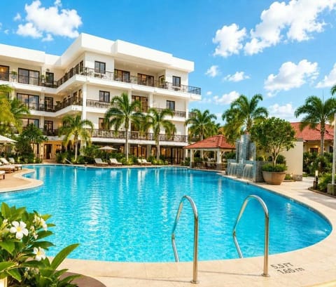Outdoor pool, open 8 AM to 9 PM, sun loungers