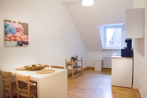 Basic Condo, 2 Bedrooms | Living area | Flat-screen TV