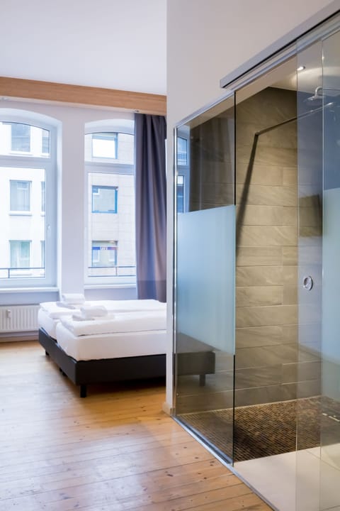 Comfort Double Room | Bathroom | Shower, free toiletries, towels, toilet paper