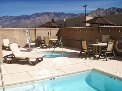 Outdoor pool, open 7:00 AM to 9:00 PM, sun loungers
