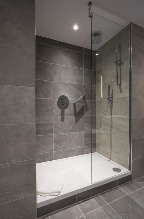 Shower, eco-friendly toiletries, hair dryer, towels