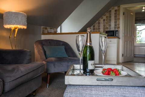 Apartment, 1 Bedroom, Balcony | Living area | 32-inch flat-screen TV with satellite channels, Smart TV