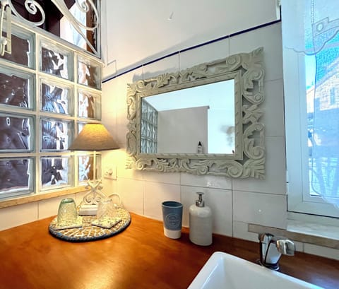 Luxury Triple Room, Terrace | Down comforters, minibar, in-room safe, individually decorated