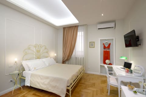 Luxury Quadruple Room ( Maria Isabella) | Premium bedding, minibar, in-room safe, individually furnished