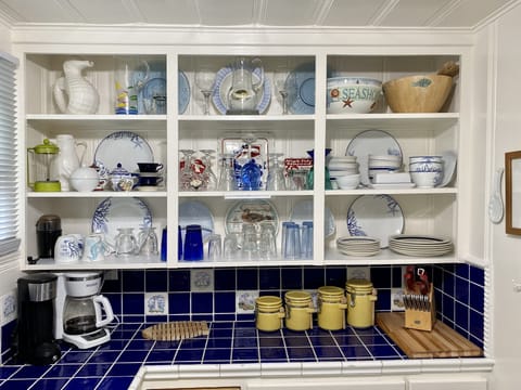 Loaded with all the dishes, glasses, cups and serving pieces you’ll need