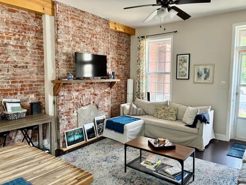 Living Room w/ Smart TV and Trundle Sofa