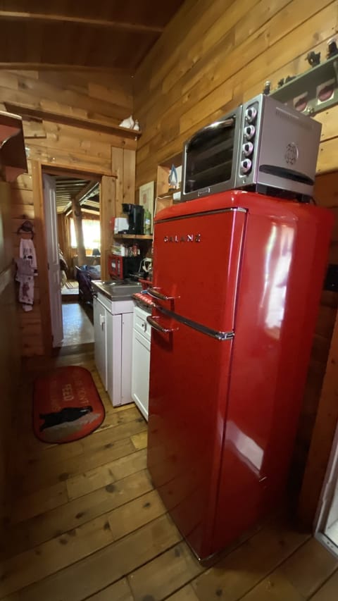 View of the kitchen looking towards the bedroom entrance