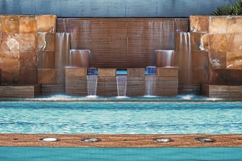 Outdoor pool, open 6:00 AM to 10:00 PM, sun loungers