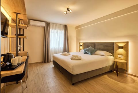 Comfort Room | Minibar, in-room safe, desk, soundproofing