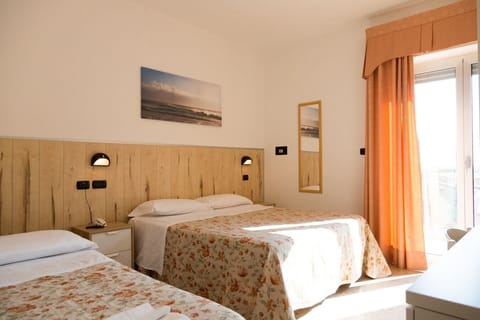 Comfort Triple Room | Minibar, in-room safe, desk, laptop workspace