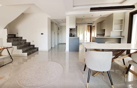 Villa | Living area | 108-inch Smart TV with satellite channels, Netflix, streaming services