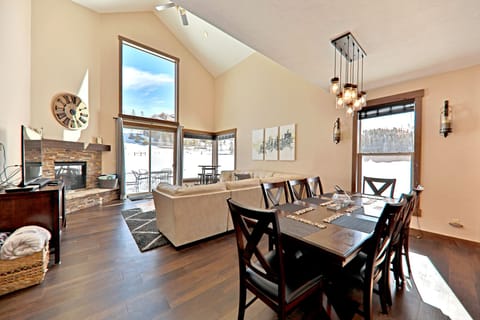 Beautiful sunny great room with huge windows to take in the views.