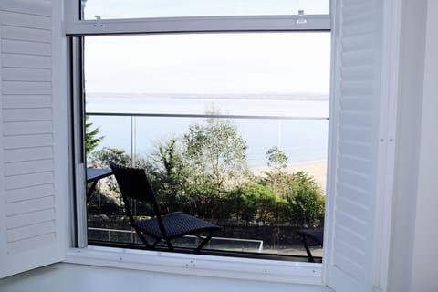Enjoy the sea views from the master bedroom