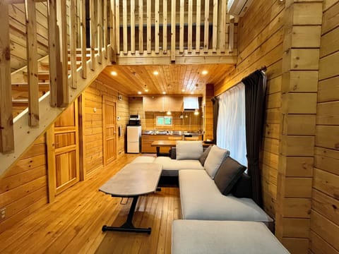 Two-Bedroom House | Living area | Flat-screen TV