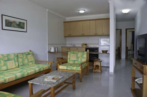 Standard Apartment, 2 Bedrooms | Living room | Flat-screen TV