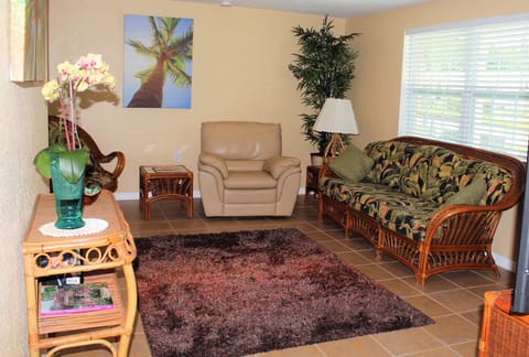 Living room with rattan and lazy boy