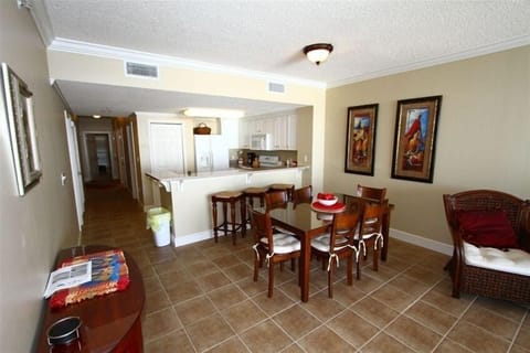 Large dining and living area with tile throughout!