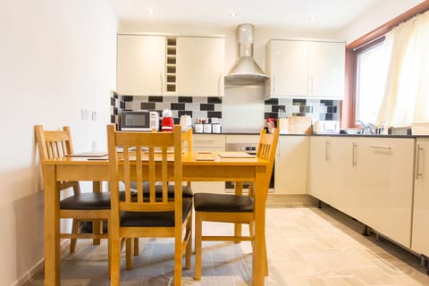 Cottage, 2 Bedrooms | Private kitchen | Full-size fridge, microwave, stovetop, dishwasher