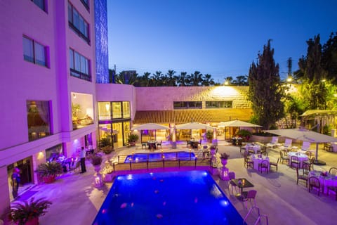 Seasonal outdoor pool, pool umbrellas
