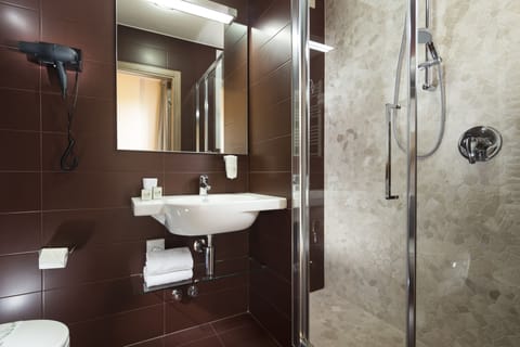 Shower, free toiletries, hair dryer, slippers