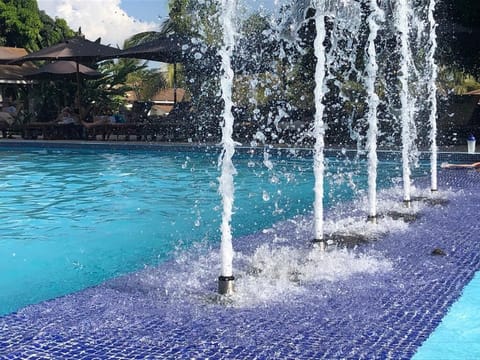 Outdoor pool, pool umbrellas, sun loungers