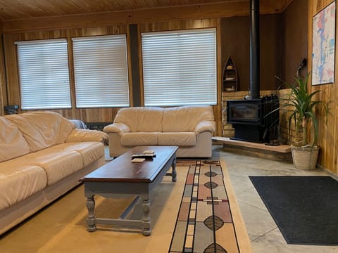 Second bedroom with seating and 48" HDTV