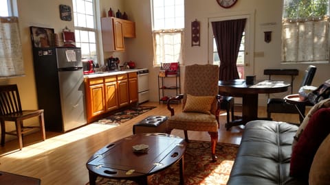 Library has a very functional kitchen, with microwave, coffee maker, toaster,..