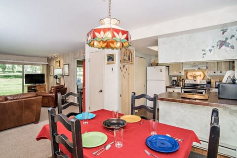 Dining area with view of kitchen and living room