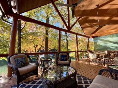 Comfortable seating on the lakefront deck, covered from the sun or rain.