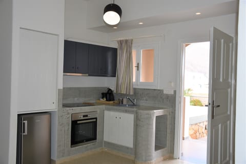 Superior Apartment, Hot Tub | Private kitchen | Fridge, oven, stovetop, electric kettle