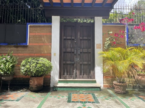 View from the front courtyard to the entryway to the villa.