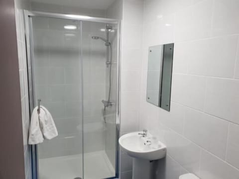 Shower, towels, soap, shampoo