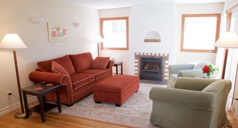 Main floor living room with gas fireplace.