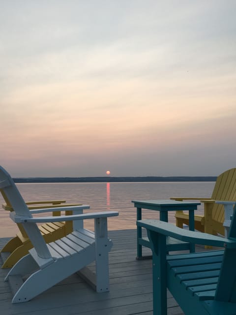 Enjoy sunsets out over the water from the dock. 