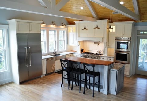 Chef's Kitchen; island, raised teak breakfast bar, Thermador appliances