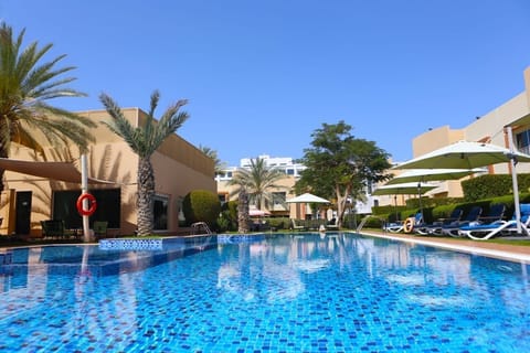 Outdoor pool, open 9:00 AM to 6:00 PM, free cabanas, pool umbrellas