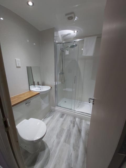 Shower, free toiletries, hair dryer, towels