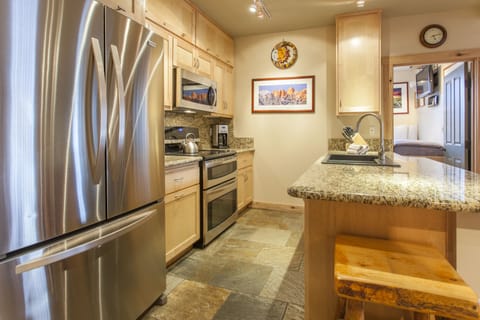 Condo, 2 Bedrooms, Mountain View (Juniper Springs Lodge #426) | Private kitchen | Fridge, microwave, stovetop, dishwasher