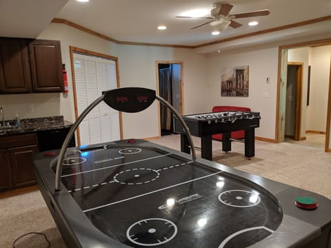 Game room with foosball and air hockey + kitchenette and TV