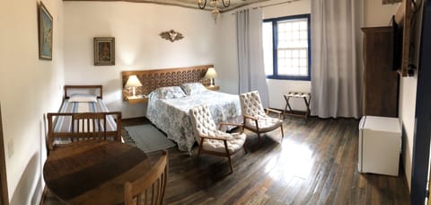 Superior Suite, 1 Queen Bed | In-room safe, individually decorated, iron/ironing board, free WiFi