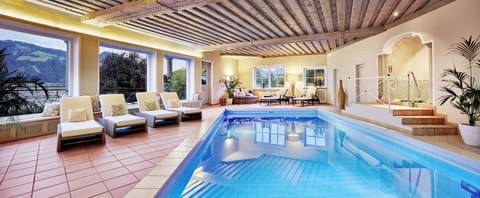 Indoor pool, seasonal outdoor pool, open 8 AM to 8 PM, free cabanas