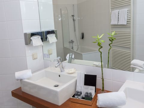 Eco-friendly toiletries, hair dryer, towels, soap